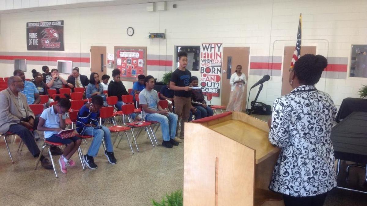 A student stands in the Rothschild Leadership Academy cafeteria to ask Muscogee County School Board chairwoman Pat Hugley Green of District 1 a question during Thursday night’s “Candid Conversation” sponsored by the Youth Advisory Council of Columbus.