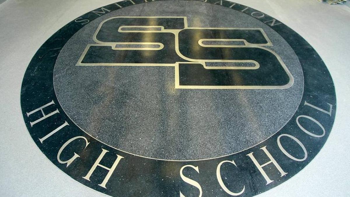 The school crest at Smiths Station High School is seen in this file April, 2011, file photo.