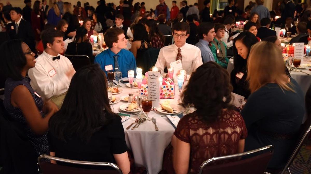 Seating arrangements were set up so that there would be at least one senior and junior at each table for the Columbus High School Holiday Social on Thursday night, December 15, 2016, in the Columbus Convention & Trade Center, where the students were able to practice their social etiquette skills