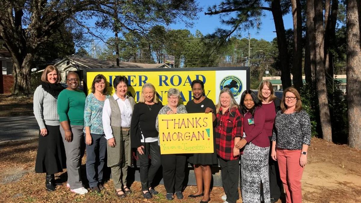 River Road Elementary School teachers pose Jan. 9, 2018, to thank the mysterious woman, known as Morgan W., who paid for their lunches last week. Pictured from left are Michele Gibson, Lois Ancrum, Carla Crowder, Yulane Wilson (retired), Sharon Dennis (retired), Shirley Booth, Tamatha Pitts, Cindy Fodor (paraprofessional), Donessa Moore, Pat Vatral and Angela Chalmers.