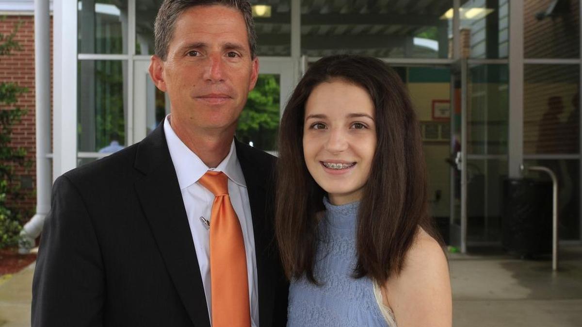 Aaron Cohn Middle School principal Richard Green and his eighth-grade daughter, Sara, pose for a photo in May 2016 on their second-to-last day at school together.