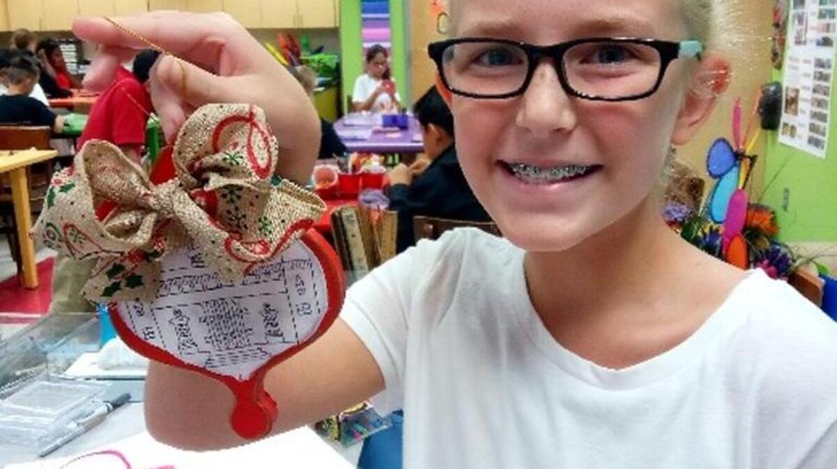 Harper Bray, a 5th-grader at Britt David Elementary Computer Magnet Academy, designed an ornament depicting an old Muscogee County courthouse that will hang on a Christmas tree at the Governor’s Mansion this Christmas.
