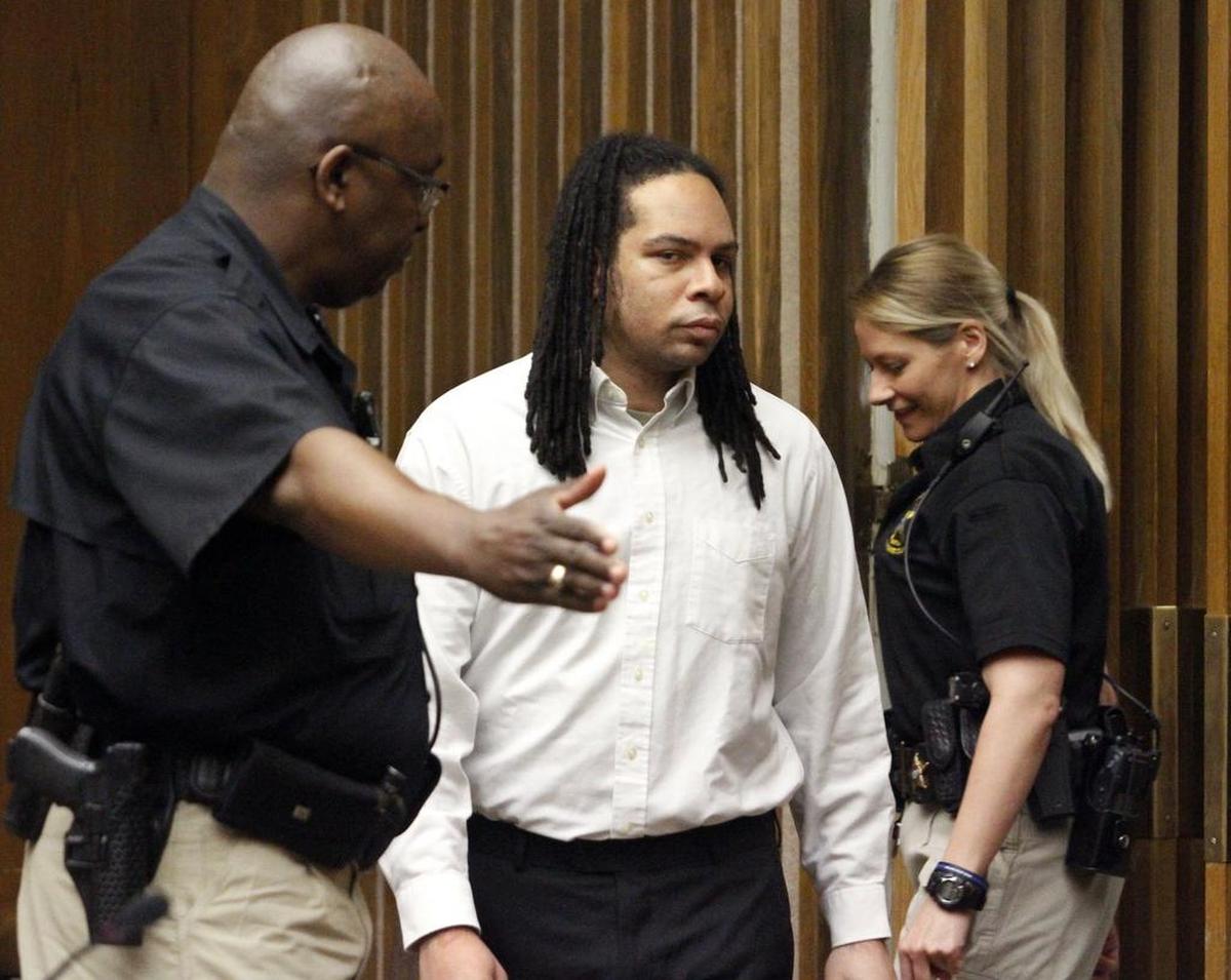 Brandon Conner, center, makes an appearance in Muscogee Superior Court on March 3, 2017.