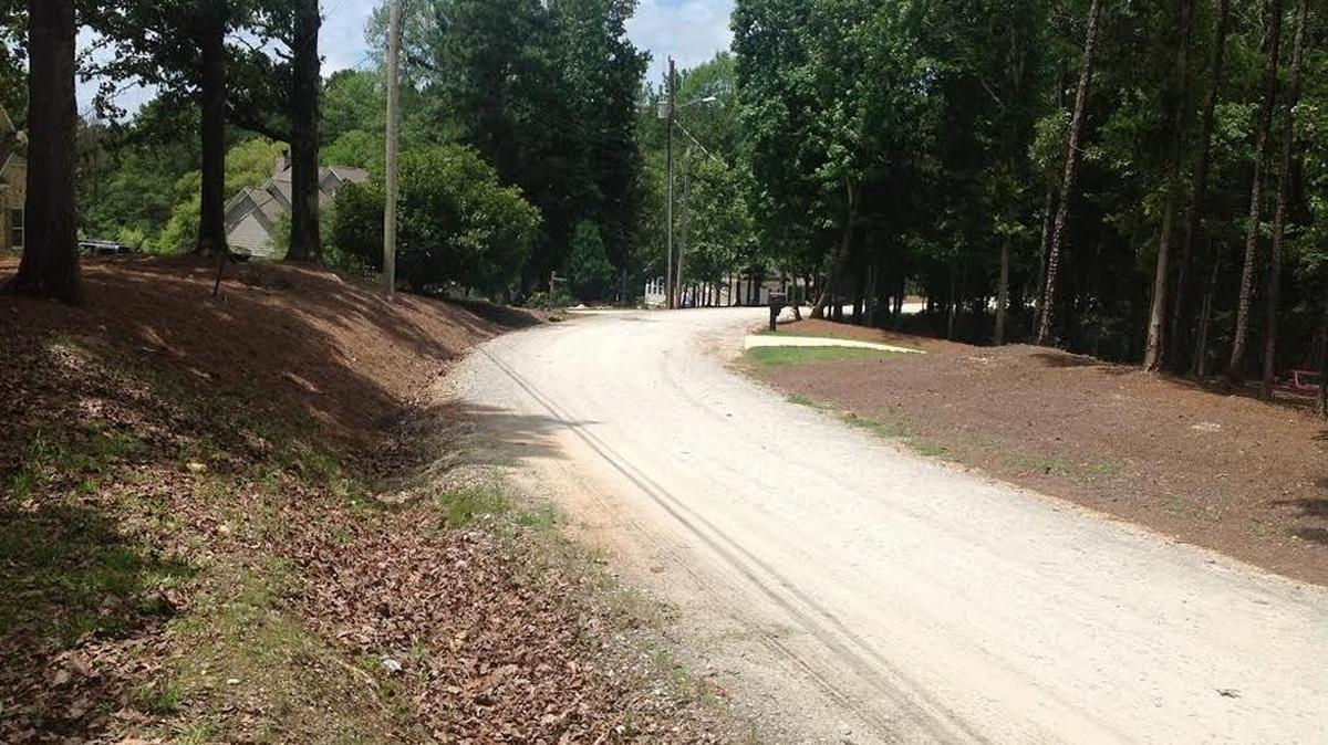 This is Old Double Churches Road in Columbus, a graveled, narrow road that doesn’t meet standards to be paved, according to city officials.