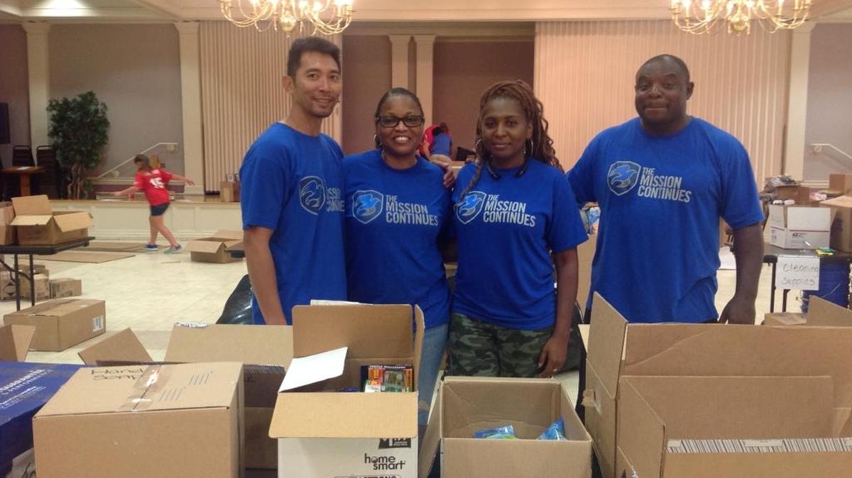 Military veterans Hai Clay, Lucy Collier, Yolanda Kent and Dejuan Bryant are members of The Mission Continues Columbus, Ga. On Sept. 29, they collected and boxed items dropped off at St. Paul United Methodist Church for hurricane victims in Puerto Rico.