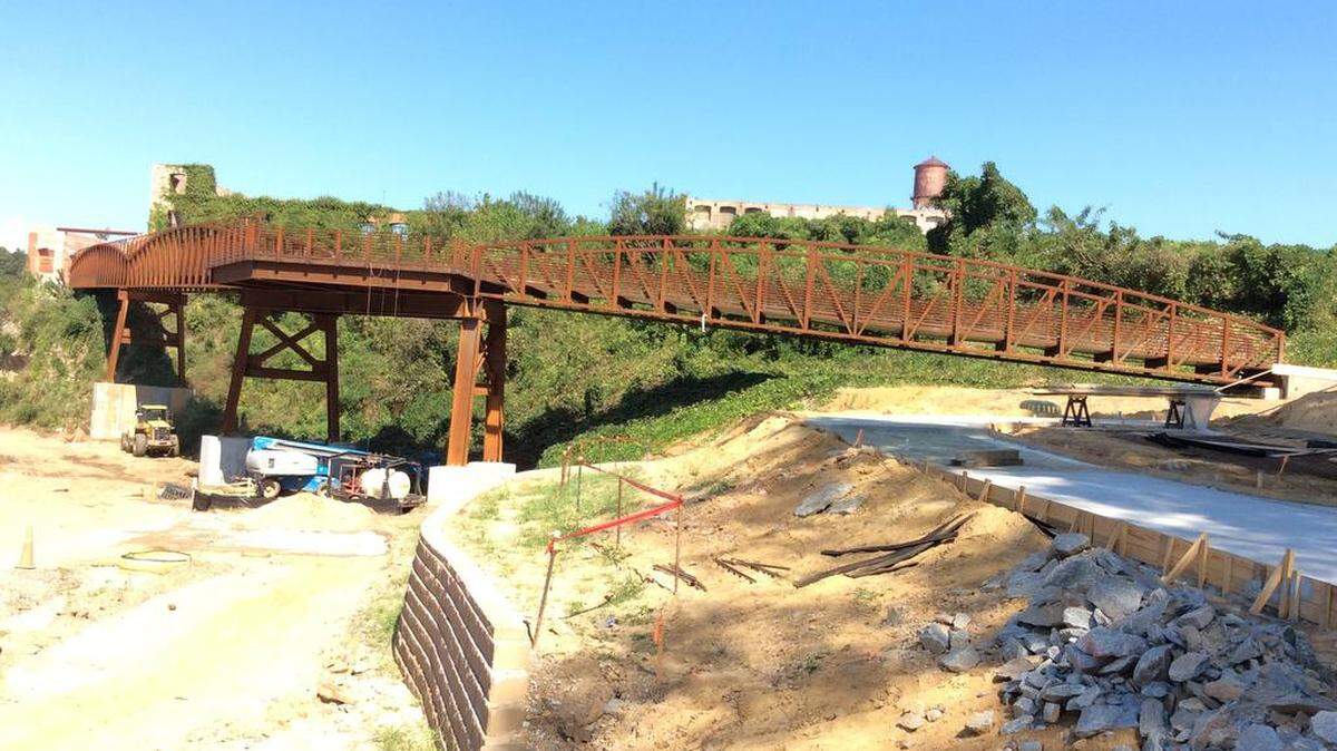 This bridge closes a 30-foot gap along the Chattahoochee Riverwalk at the North Highlands Dam in Bibb City. It may be completed by late November or early December, city official says.