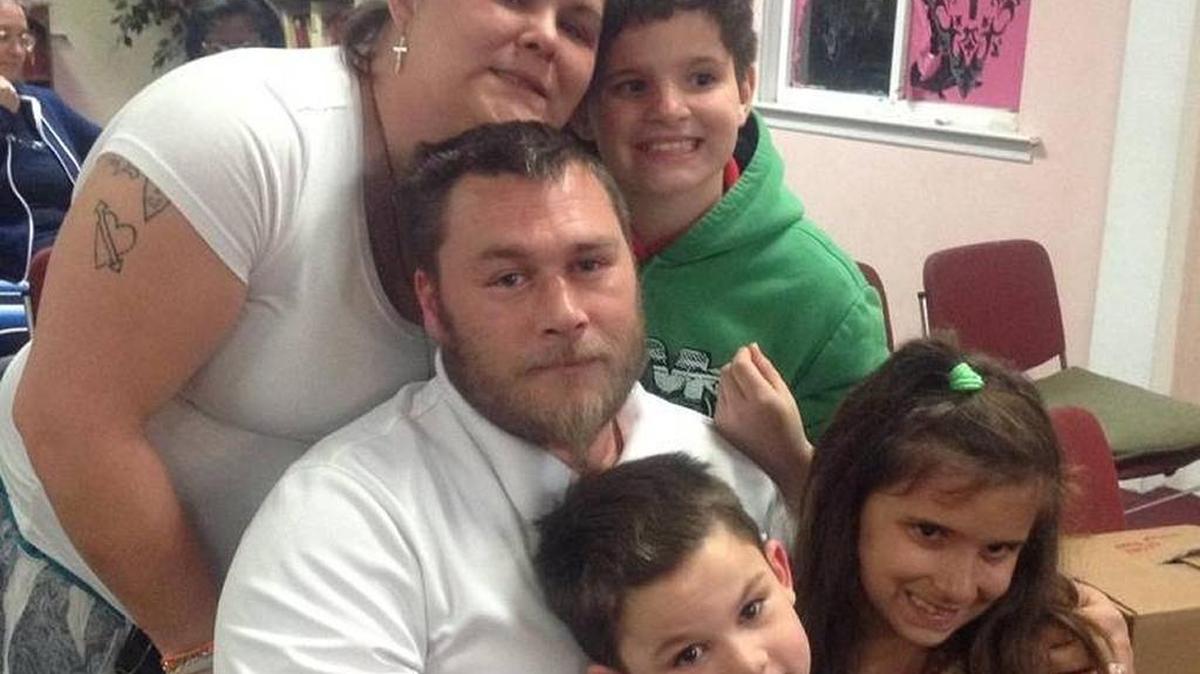 James Evans, his wife, Amanda, and their three children were counted among the homeless at the House of Mercy homeless shelter Monday night. Evans said he stopped working to care for his family after his wife was diagnosed with a serious medical condition.