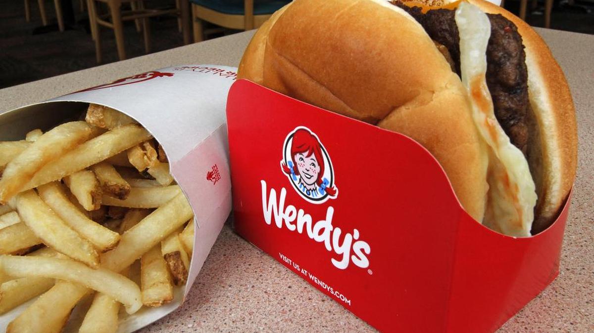 This photo shows a Wendy's single with cheese large combo meal.