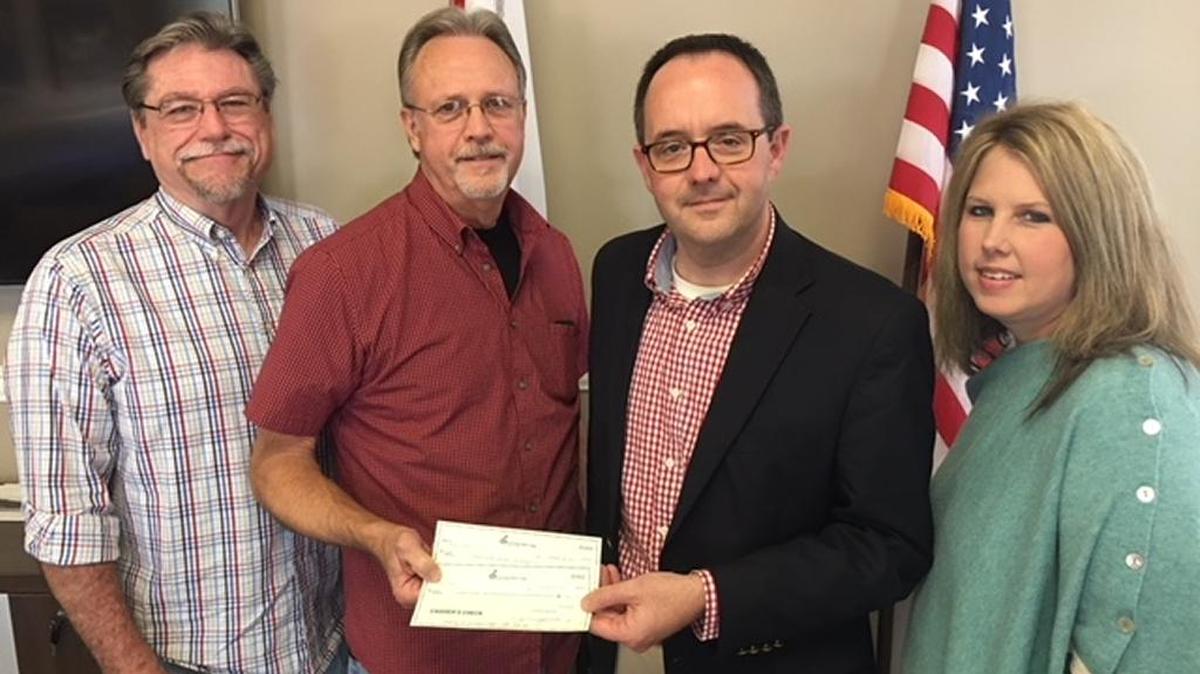 Attending animal shelter donation are (l-r) Terry Page, Steve Fondren, Jim Thornton, Meg Kelsey