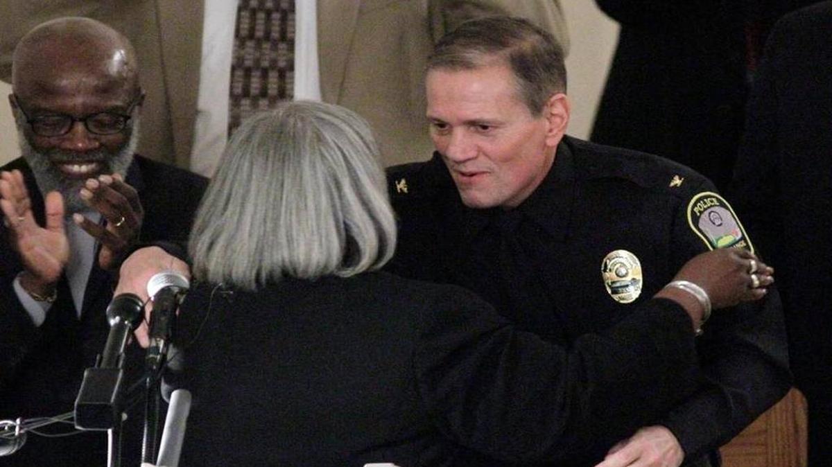 Deborah Tatum and LaGrange Police Chief Lou Dekmar hug after Tatum responded, on behalf of the Austin Callaway family, to the chief's official apology for the 1940 lynching of teenager Austin Callaway. The police chief addressed an overflow audience at Warren Temple United Methodist Church on Jan. 26, 2017, citing the historical events surrounding Callaway's death and the importance of an official apology to the family for the role of the law enforcement in allowing the racially motivated killing to occur 77 years ago.