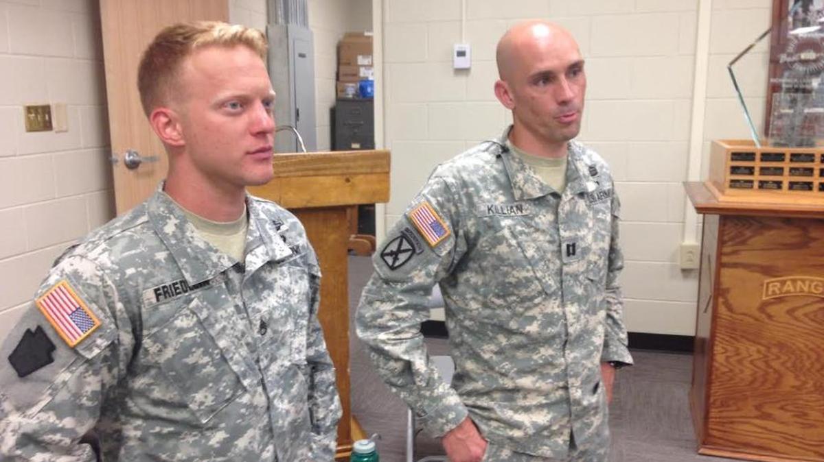 Staff Sgt. Erich Friedlein, left, and Capt. Robert Killian talk to the media Monday as they prepare for this weekend’s Best Ranger Competition at Fort Benning.