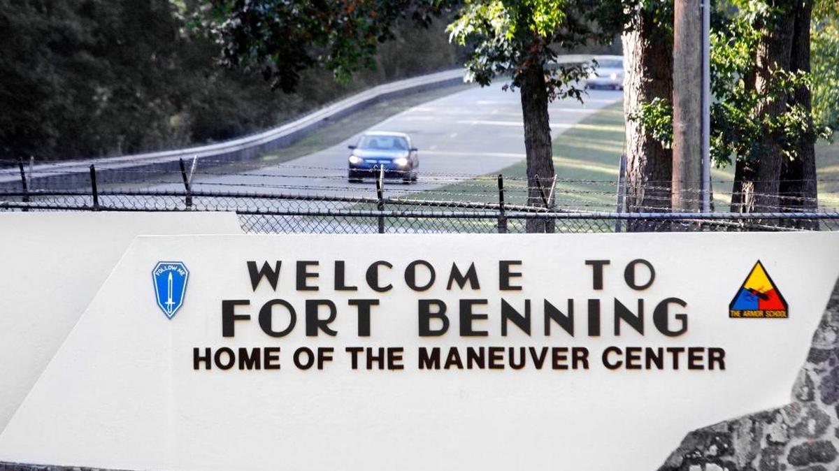 The Fort Benning entrance is shown.