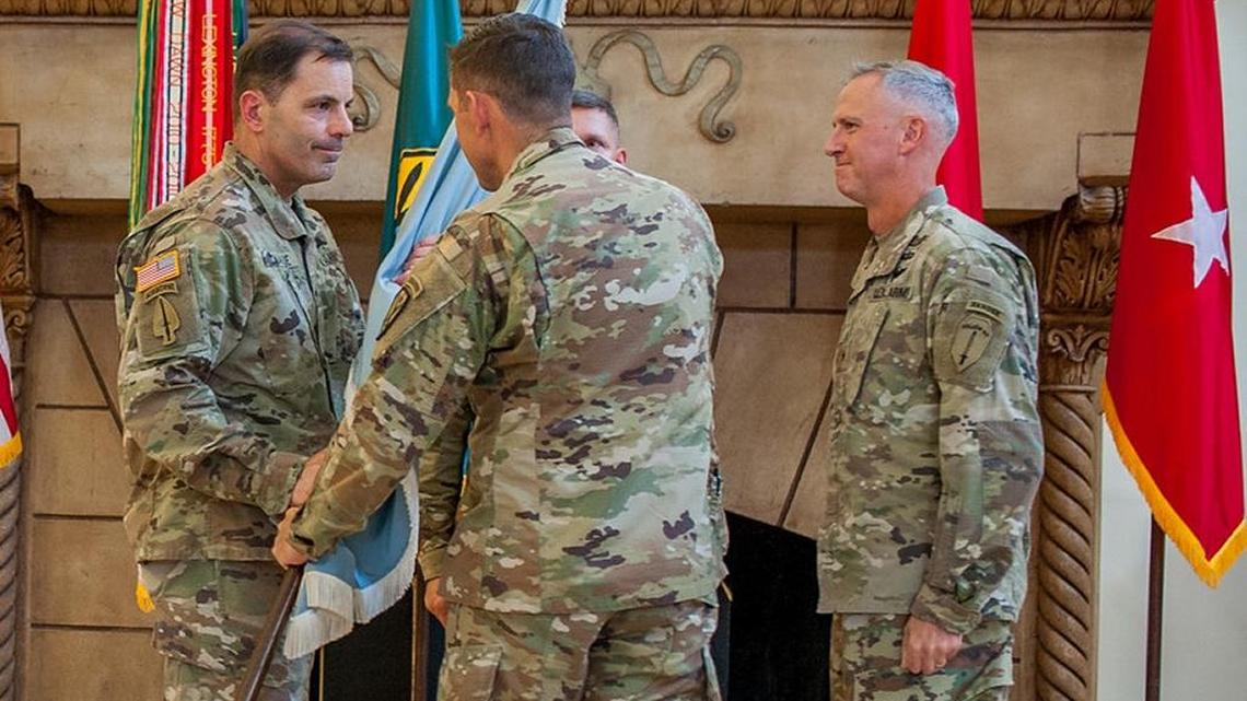 Brig. Gen. Peter L. Jones, at right, relinquishes responsibility as the Infantry School Commandant, U.S. Army Maneuver Center of Excellence at Fort Benning, to Brig. Gen. Christopher T. Donahue, Aug. 11, 2017 at the Benning Club. Maj. Gen. Eric J. Wesley was the reviewing officer. (Photo by: Patrick A. Albright/MCoE PAO Photographer)