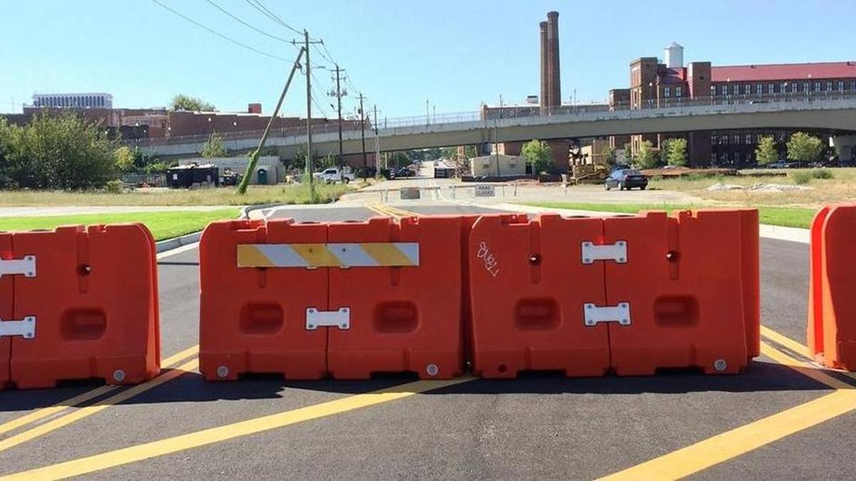 The orange barricades on the south side of the 14th Street roundabout should be going away soon.
