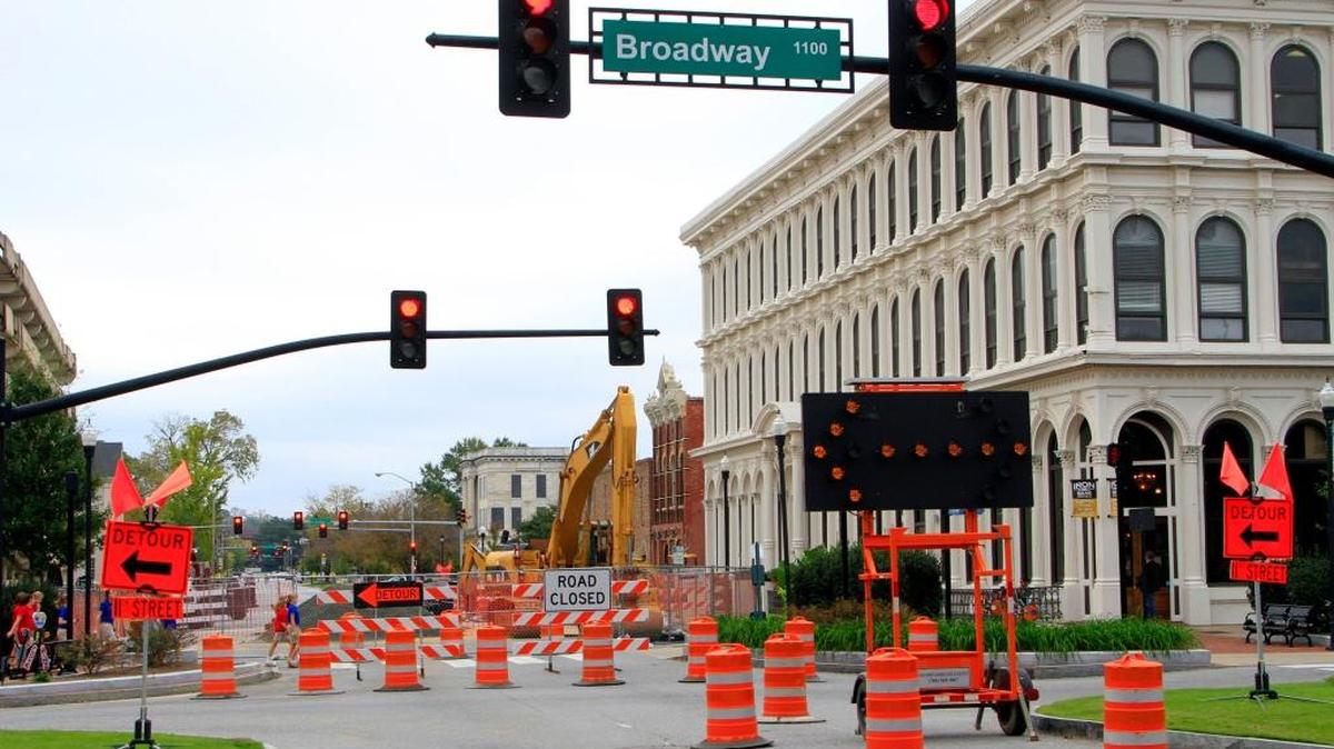 This 2015 file photo of repairs being made to sewer lines underneath 11th Street are the kinds of things that could be addressed under a TAD. 11/04/15