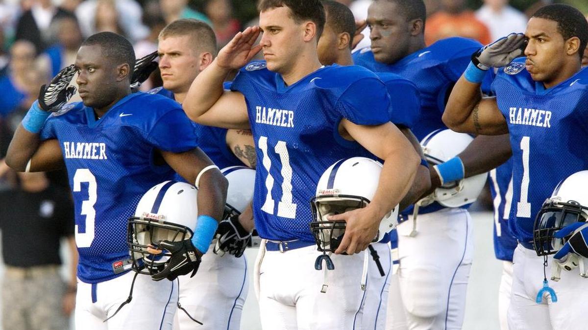 Robin Trimarchi rtrimarchi@ledger-enquirer.com
Soldiers with the 3rd Heavy Brigade Combat Team stand at attention during the presenting of the colors and playing of The Star Spangled Banner before the Doughboy Classic gets underway at Doughboy Stadium Thursday. The brigade fielded a team to face the Columbus State University Club Sport Tackle Football team.  10.28.10