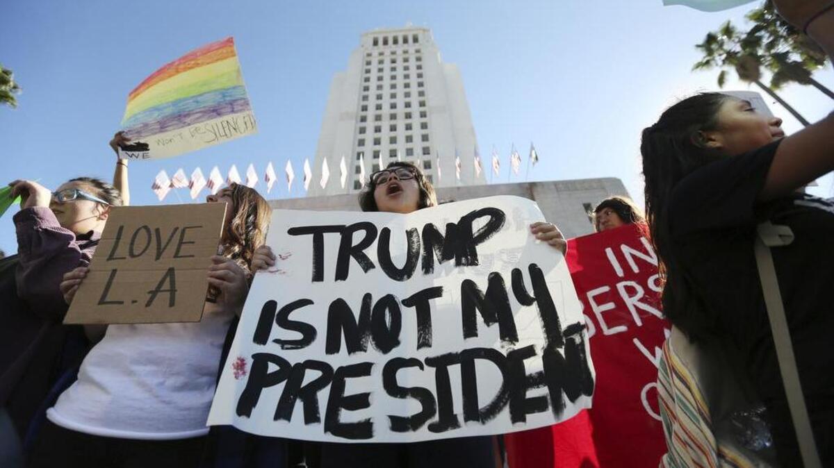 Students from several high schools rally after walking out of classes to protest the election of Donald Trump at City Hall in downtown Los Angeles Monday, Nov. 14, 2016.
