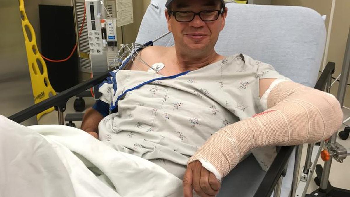 Deron Hicks, a Columbus attorney who shoots photographs at the Brookstone football games, got a little close to the action last week and ended up in the hospital with a broken arm above the wrist.