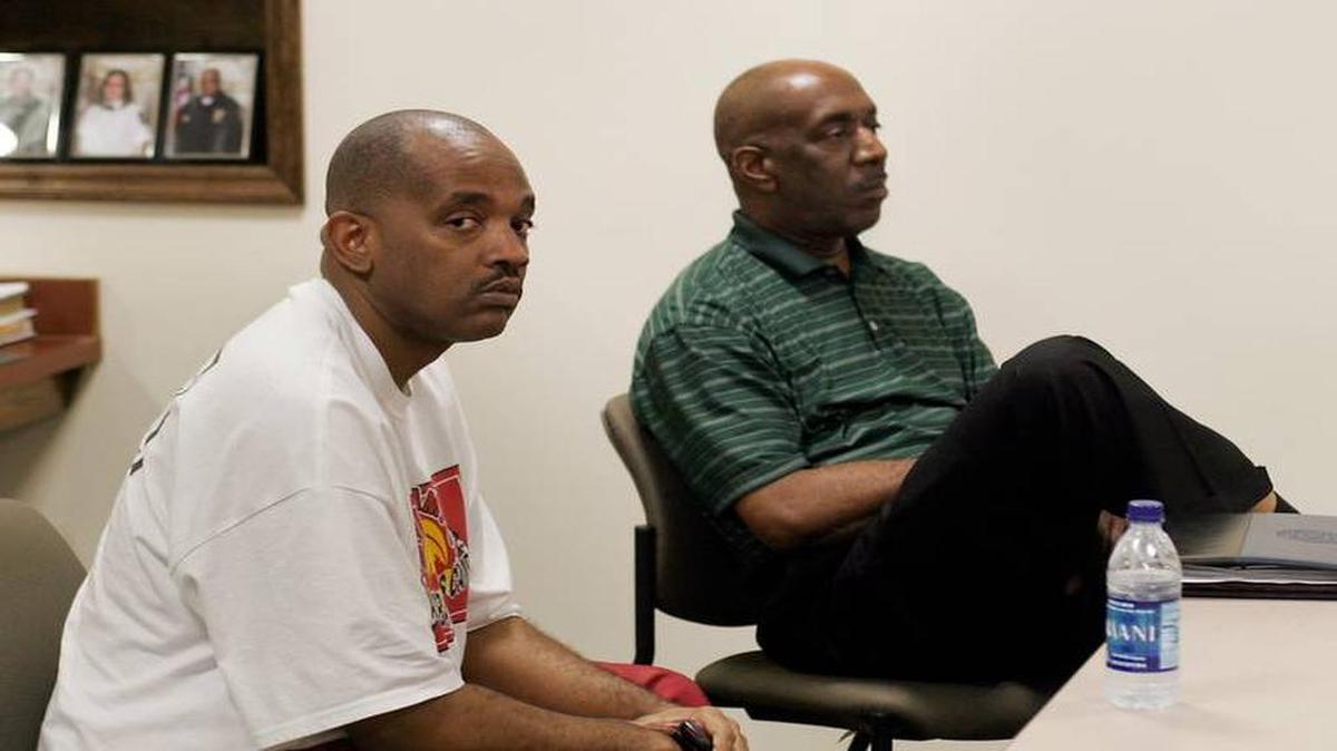 Former city employees Herman Porter, left, and Tony Adams during the 2010 investigation into the AAU basketball team sponsored by Nike they were running out of the city’s Parks and Recreation Department.