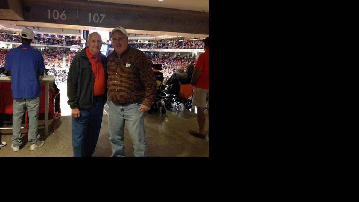 Enjoying at Saturday night basketball game with my dad.