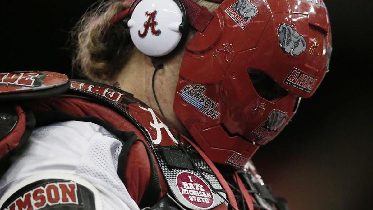 Wonder what year this guy graduated? An Alabama (no kidding!) attends the Crimson Tide’s NCAA college football playoff game with the University of Washington on New Year’s Eve in Atlanta in 2016.