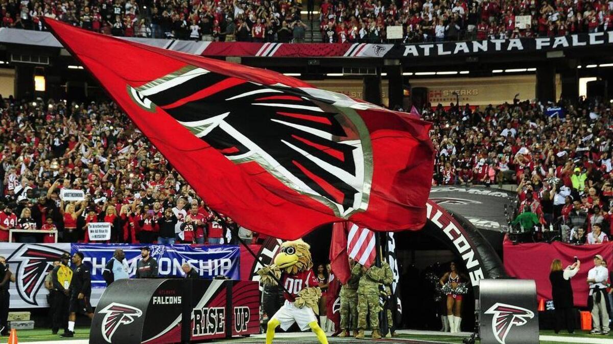 Atlanta mascot Freddie Falcon runs on to the field prior to the NFC Championship Game against the Green Bay Packers on Sunday at the Georgia Dome in Atlanta.