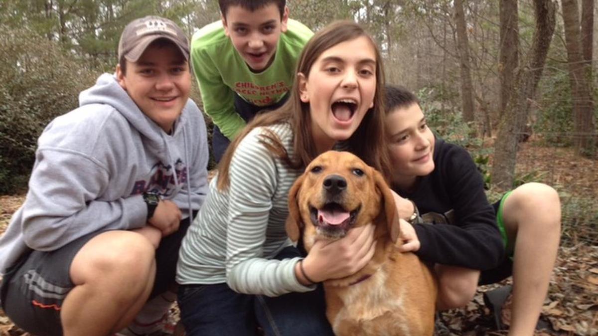 The Kendrick-Holmes children the day that Dexter joined their family.