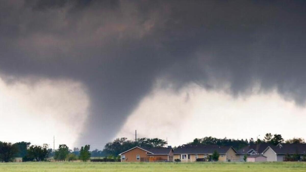 It’s not unhealthy to prepare for a tornado, even if it never shows up. Here, a tornado passes near Halstead, Kan., on May 6, 2015.