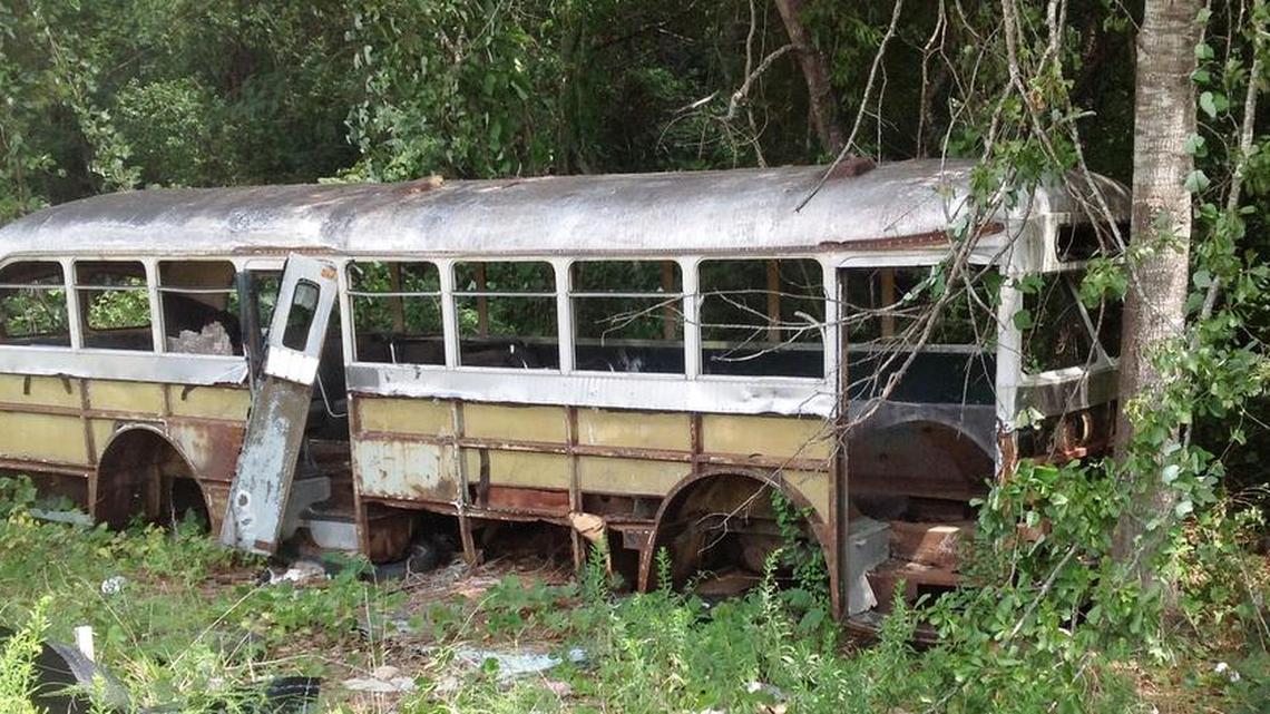 Decrepit bus in the woods could be from the old Howard Bus Lines