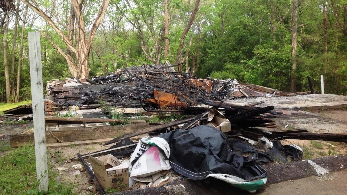 This house in City Village burned down recently and must be demolished and removed, according to city ordinance.
