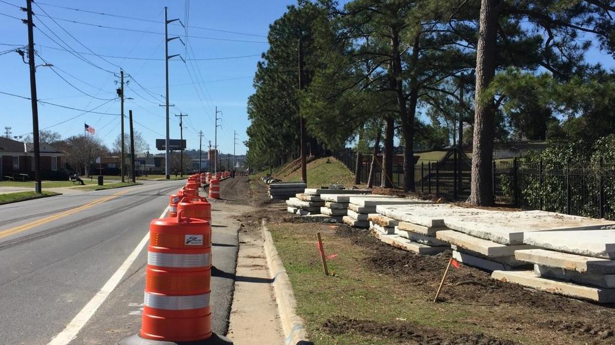 Asphalt has been removed along the right side of Linwood Boulevard to make way for The Dragonfly path.