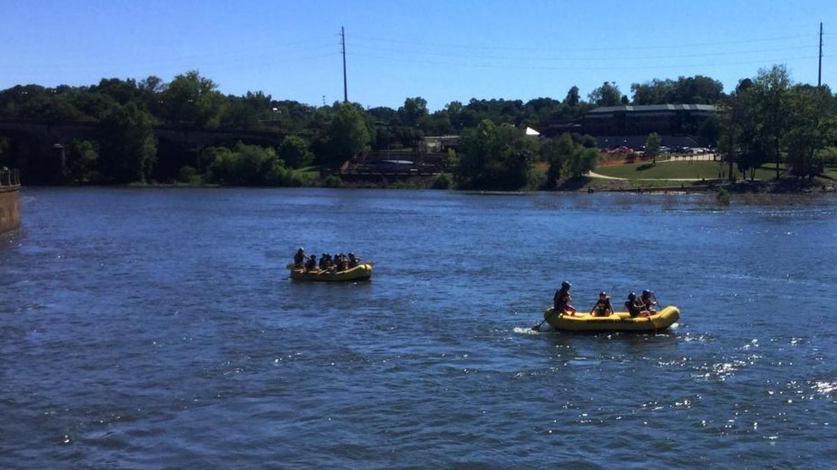 Whitewater rafters drift downriver on an early June day when meteorologist Kurt Schmitz says summer already was here.