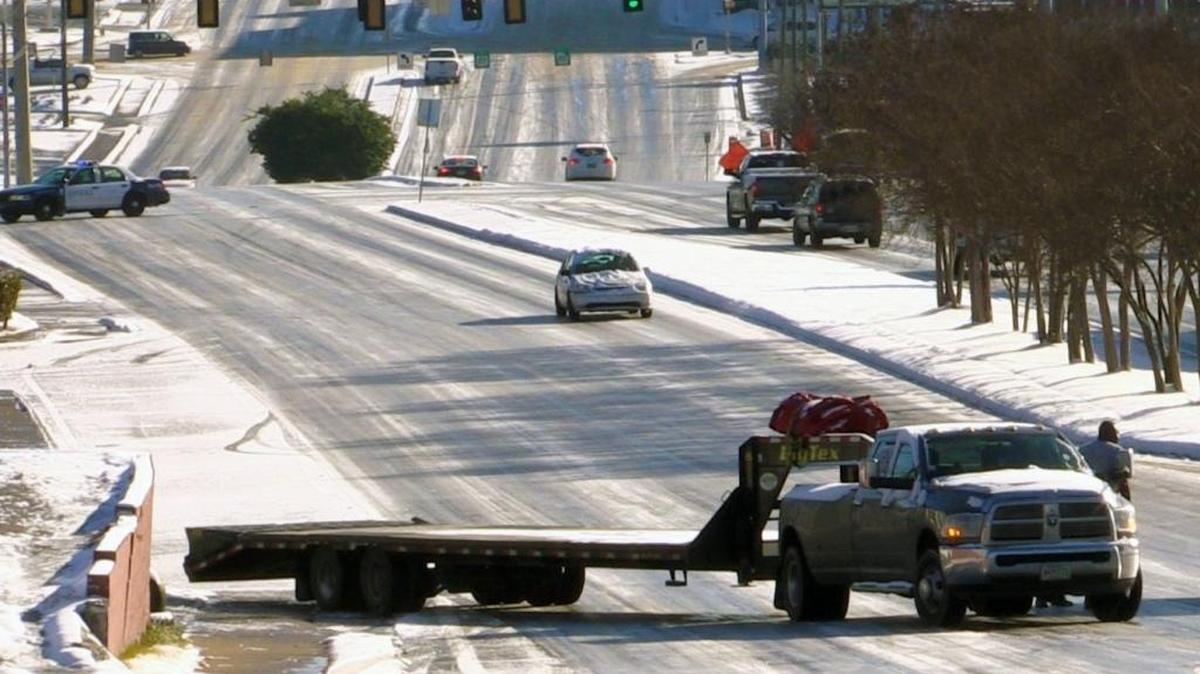 A Motorist pulling a trailer 