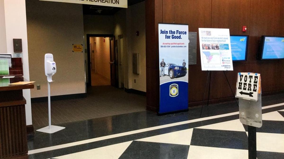 No line for early voting trailed from the touch-screen machines to the lobby Friday at the Citizens Service Center.