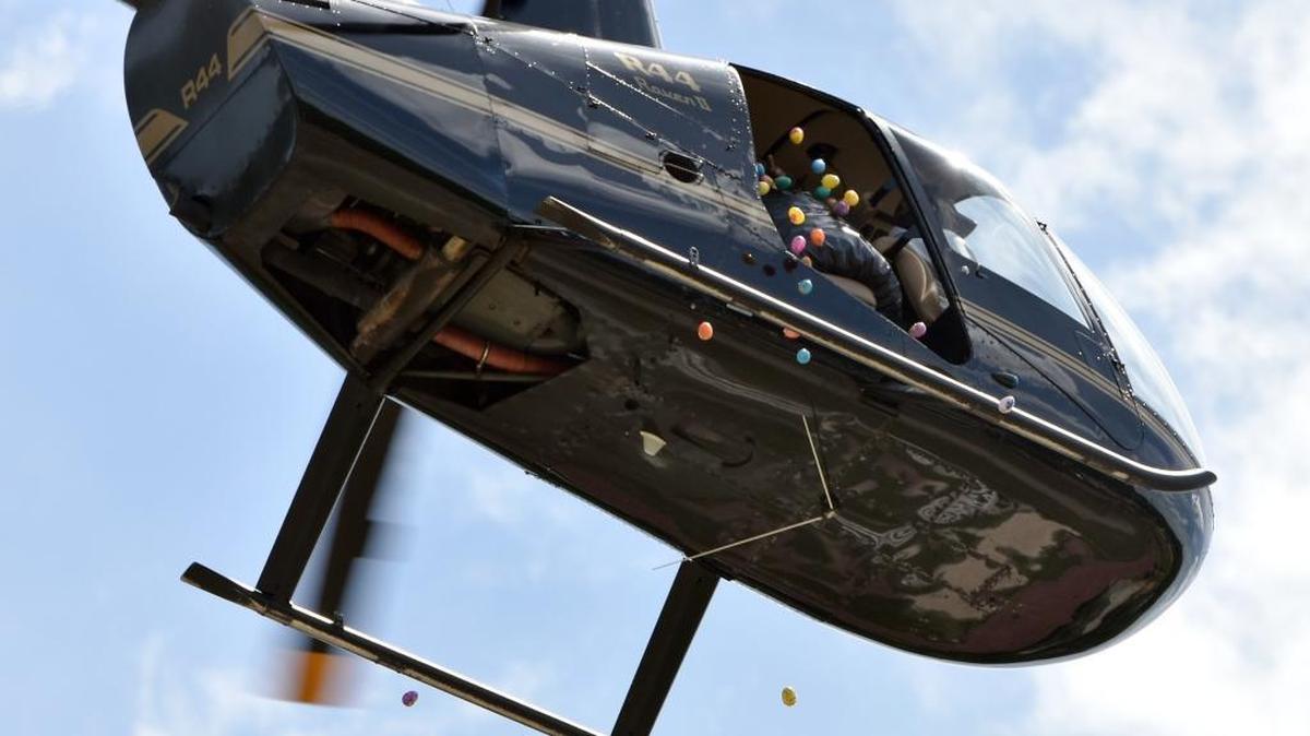 A helicopter dropped Easter eggs over Lakebottom Park for the Bridge Church community-wide event on April 15, 2017.