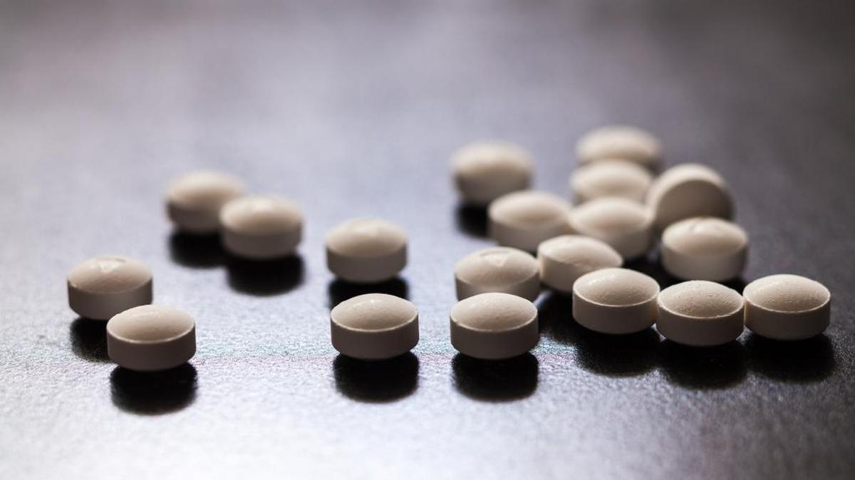 Opioid medication is displayed on a table.