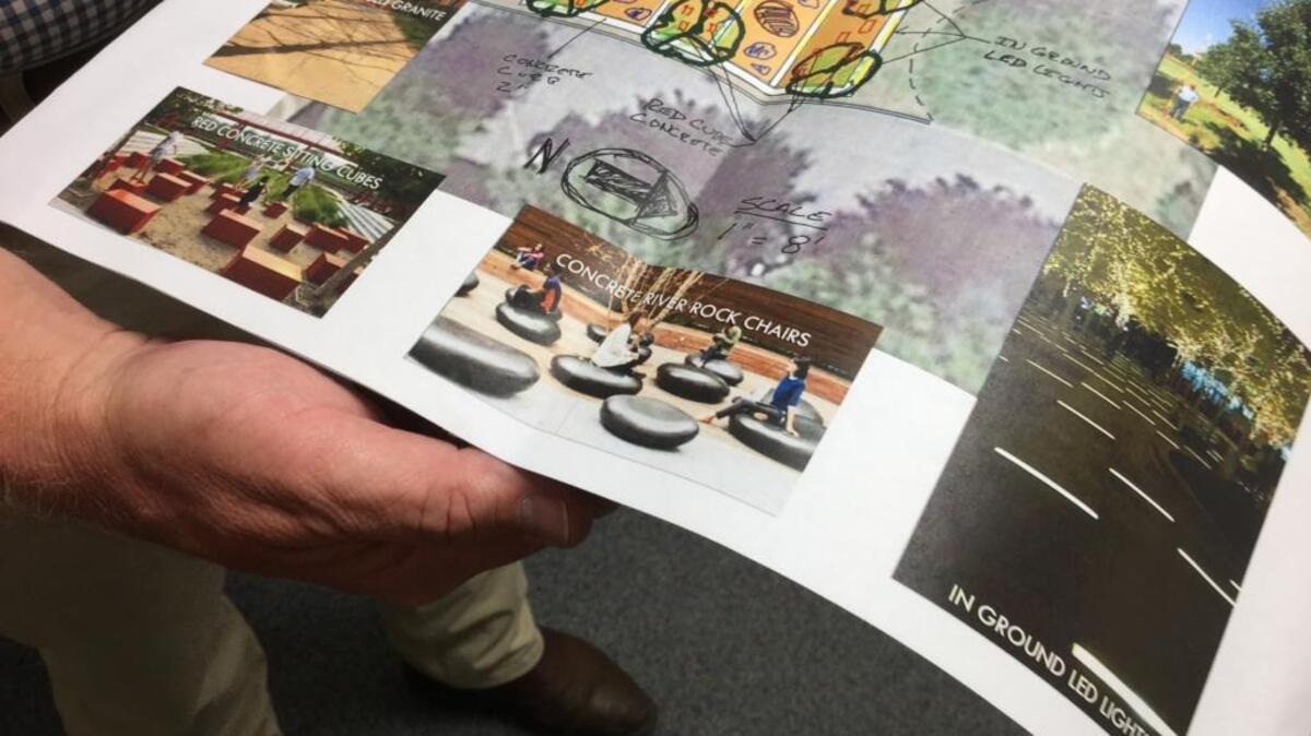 Columbus architect Will Barnes shows conceptual plans for a pocket park in the 1200 block of Broadway.