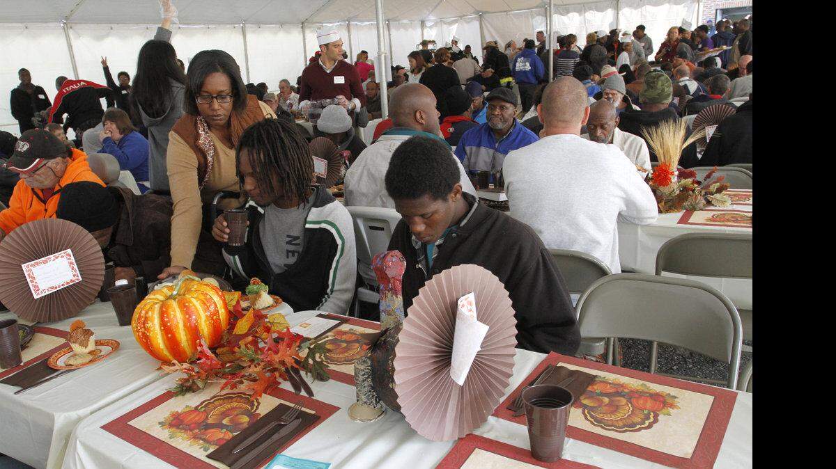 About 150 volunteers served 1,000 meals during Thanksgiving day festivities last year at Valley Rescue Mission . The annual event is drawing an increasing number of women and families with young children.