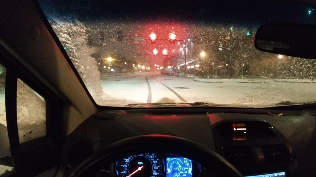 Georgia and local officials are encouraging residents to stay home as a winter ice storm approaches