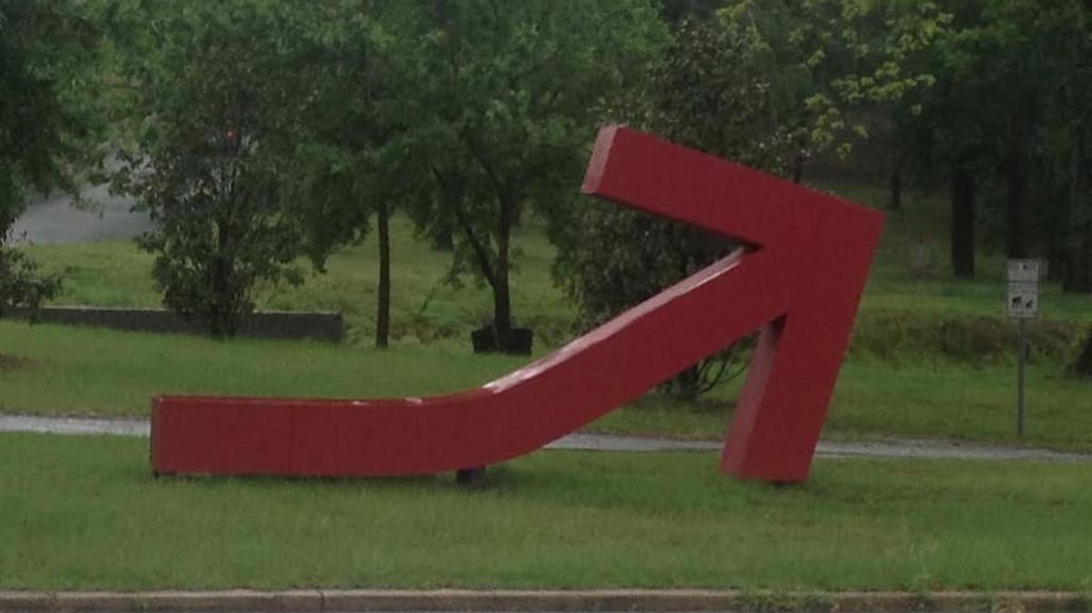 This red arrow points west to The Village on 13th Street in Columbus. It’s part of MidTown Inc. plan to connect the area with Uptown.