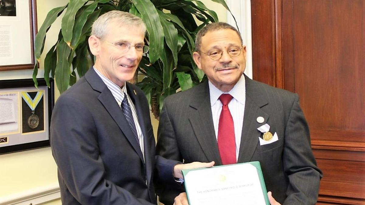 Acting Secretary of the Army Robert Speer presents U.S. Rep. Sanford Bishop with the Army Distinguished Civilian Service Medal on Thursday.