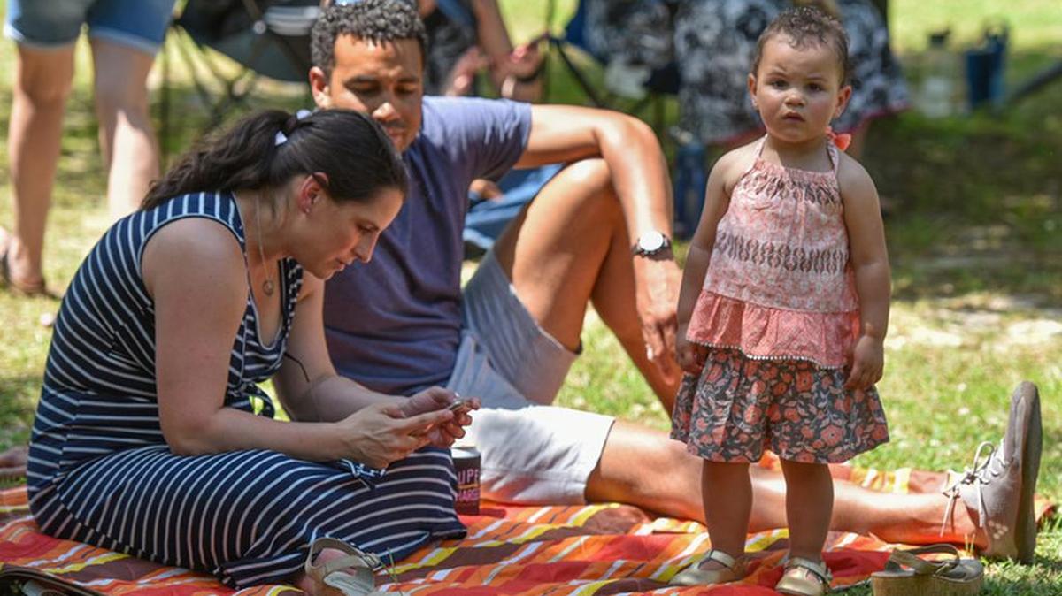 This file photo shows attendees of the MidTown GetDown in 2019.