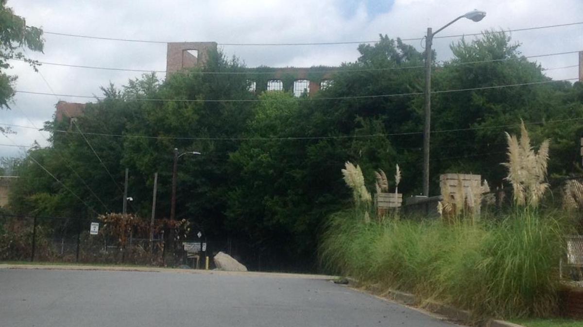 The Chattahoochee Riverwalk will have to go up and over this hill next to the North Highlands Dam.