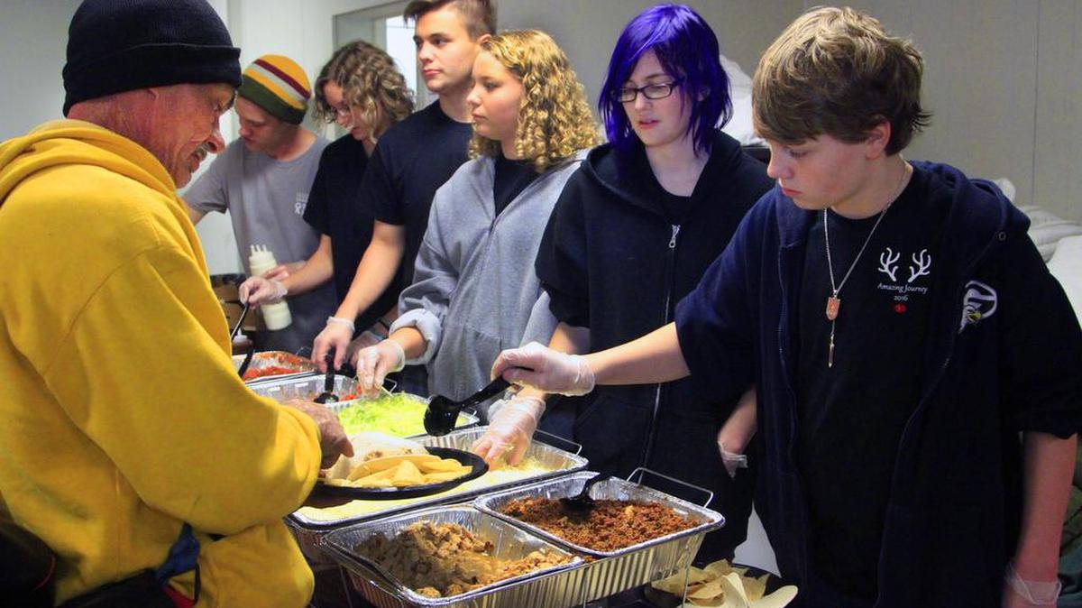 Members of the homeless community were treated Friday to a unique holiday lunch featuring a taco bar from Barberitos restaurant and pizza from Your Pie. Barrett Feighner, the local franchisee for the restaurants, employees and other volunteers fed more than 200 people who showed up for lunch. SafeHouse provides two meals a day, breakfast and lunch, 365 days a year. Organizations interested in providing meals for the homeless can learn more and coordinate their efforts at bridgetohopeinthevalley.com.