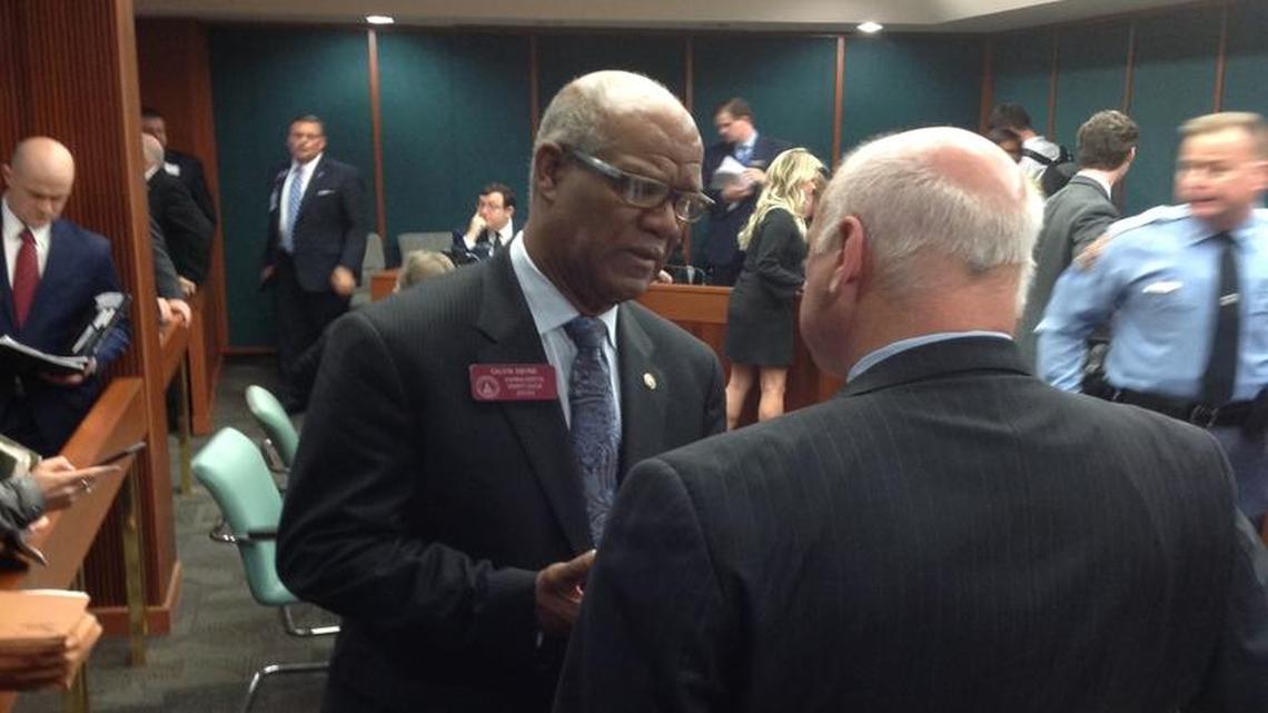 Rep. Calvin Smyre, D-Columbus, talks with Sen. Brandon Beach, R-Alpharetta, Thursday afternoon prior to a Senate committee hearing to discuss casino gambling legislation in Georgia.