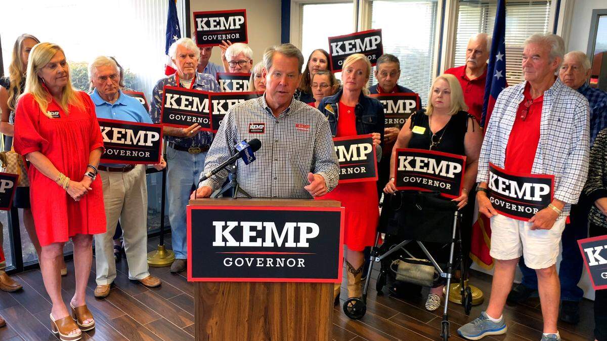Gov. Brian Kemp and his family were joined by other statewide candidates for office in a Columbus rally. Kemp appeared headed for a reelection win as votes were counted late Tuesday night.