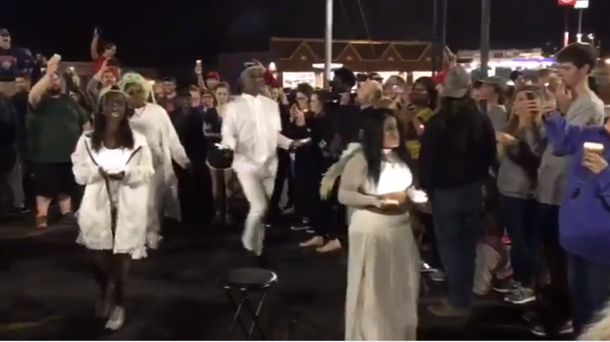 Around 100 Alabamians held a tongue-in-cheek candlelight vigil for a burned-down Taco Bell in Montgomery, Alabama.