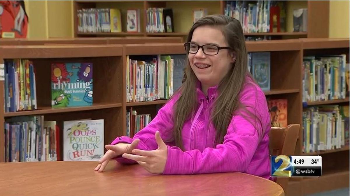 Carly Ortega, a 12-year-old Deaf girl from metro-Atlanta, will sign the National Anthem during Monday’s championship game in honor of her mom, a UGA fan who passed of cancer.