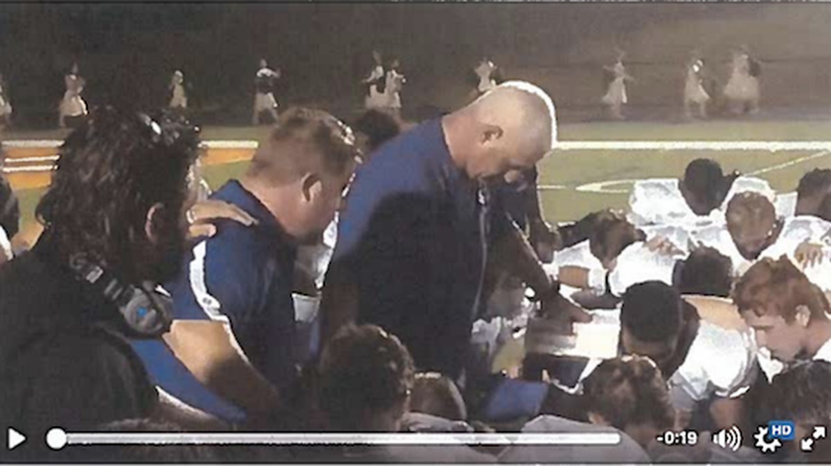 East Coweta High School football coach John Small was seen in a video participating in a prayer with his players during a recent game. A football game attendee submitted a complaint to the Freedom From Religion Foundation who ordered the school district to take immediate action and cease having any employees lead or participate in prayer with students.