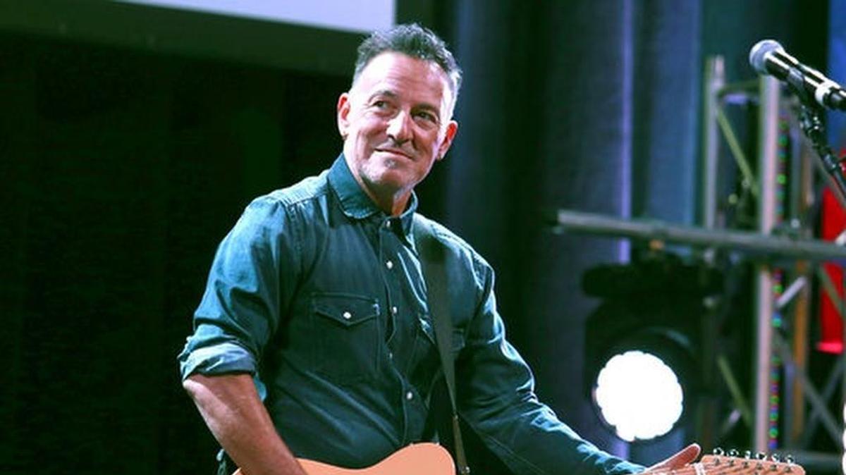 FILE - In this Nov. 1, 2016 file photo, Bruce Springsteen performs at Stand Up For Heroes in New York. Sotheby's said Friday that it will auction a handwritten working manuscript of "Born to Run" in June. The presale estimate for the single sheet of notebook paper with 30 lines of writing is $200,000 to $300,000. (Photo by Greg Allen/Invision/AP, File)